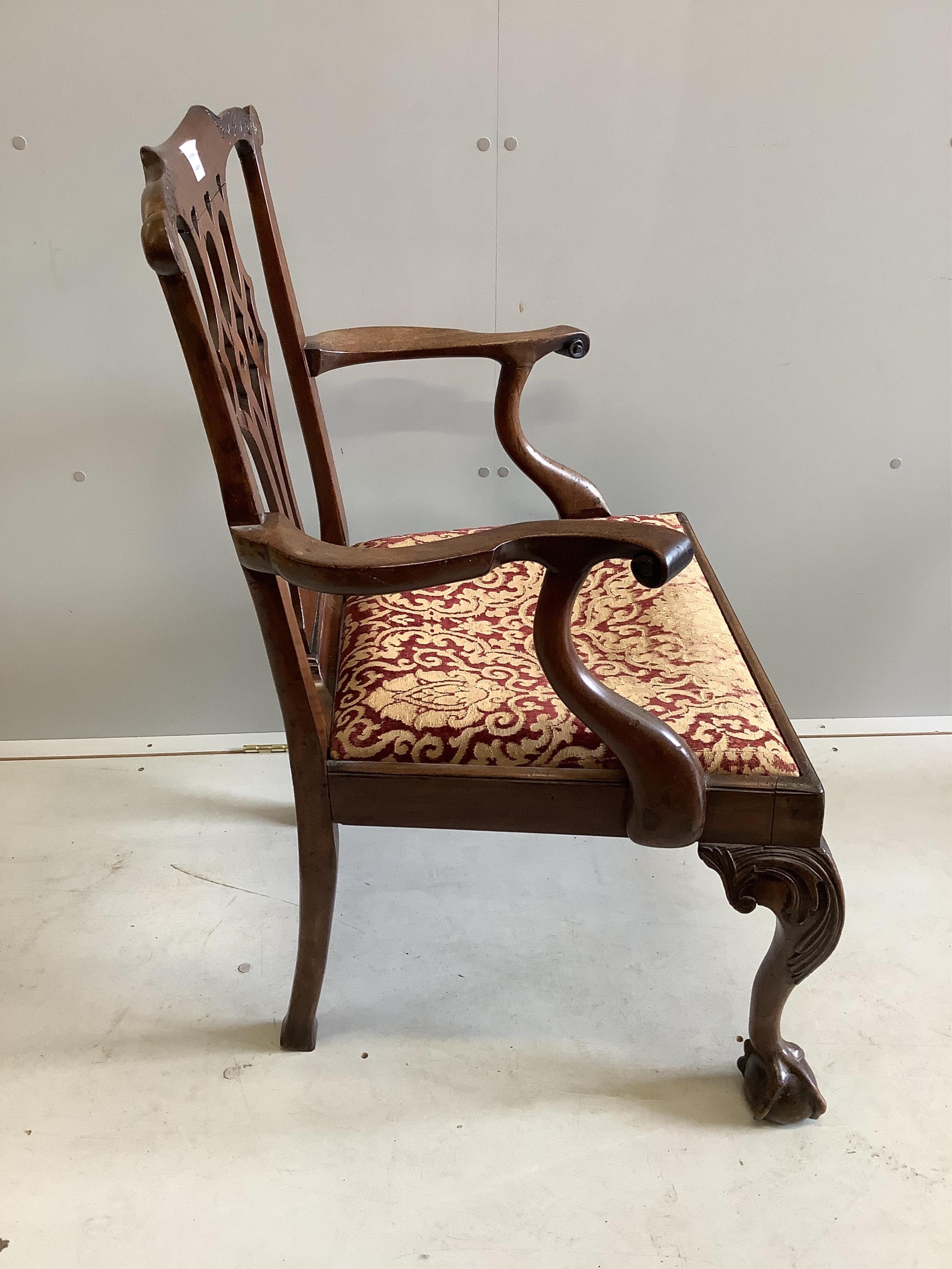 A George III Chippendale style mahogany elbow chair, width 66cm, depth 52cm, height 96cm. Condition - fair